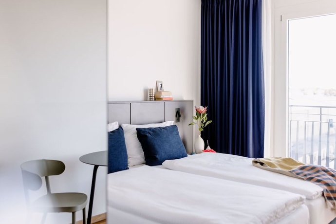 Imagen de la habitación del Hotel THE FLAG Meiller G&auml;rten. Foto 3