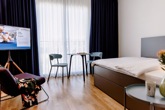 Imagen de la habitación del Hotel THE FLAG Meiller G&auml;rten. Foto 6