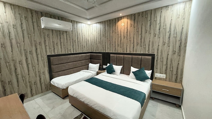 Imagen de la habitación del Hotel THE GRAND LUXURY STAY HOTEL. Foto 5