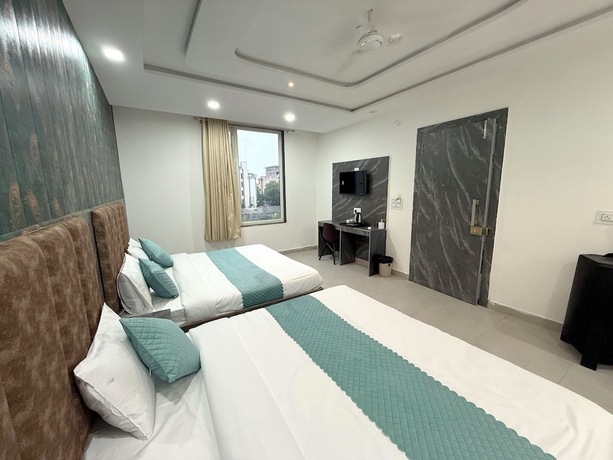 Imagen de la habitación del Hotel THE GRAND LUXURY STAY HOTEL. Foto 7