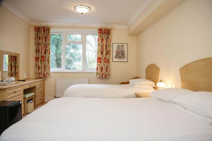 Imagen de la habitación del Hotel THE GROVE HOTEL. Foto 11
