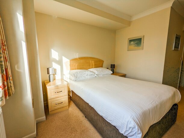 Imagen de la habitación del Hotel THE GROVE HOTEL. Foto 13