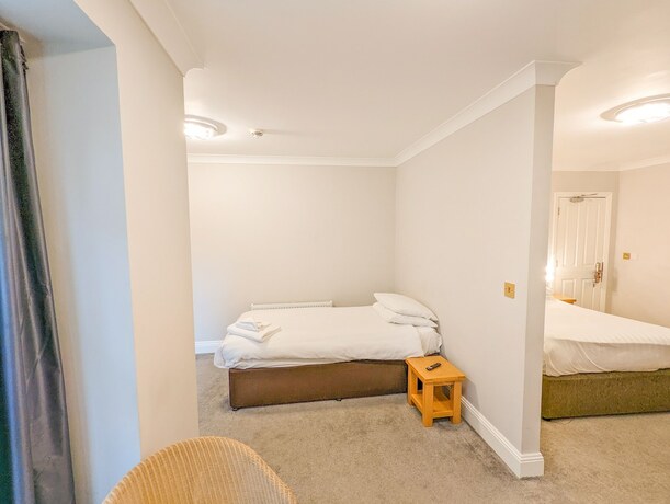 Imagen de la habitación del Hotel THE GROVE HOTEL. Foto 16