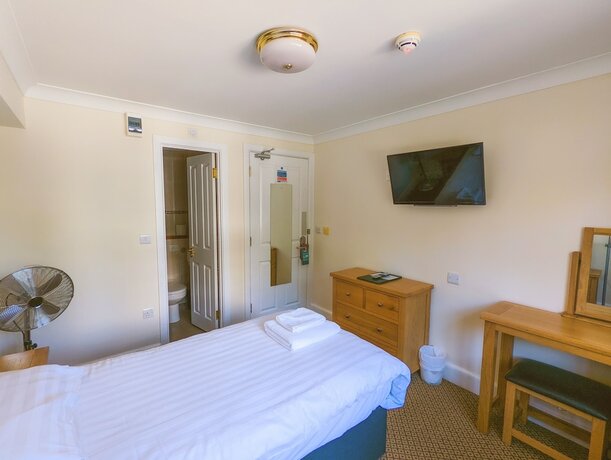 Imagen de la habitación del Hotel THE GROVE HOTEL. Foto 19
