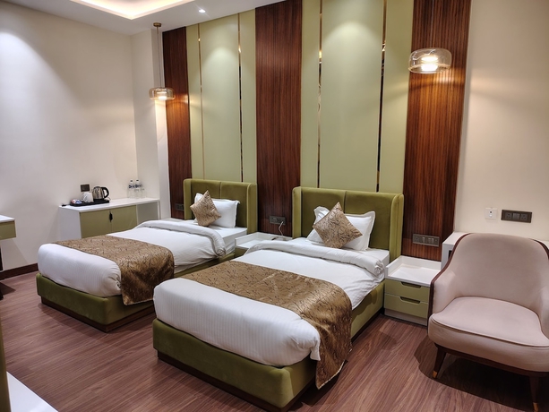 Imagen de la habitación del Hotel THE HOLY AWADH HOTEL. Foto 10