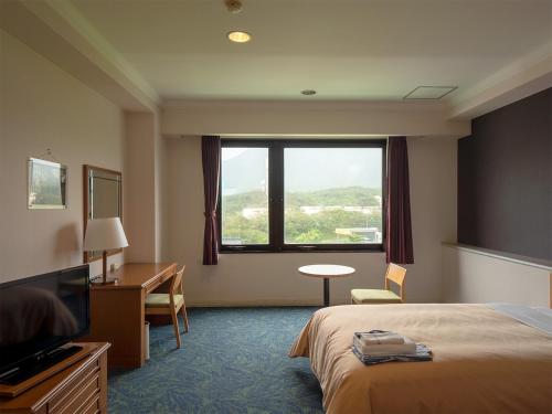 Imagen de la habitación del Hotel THE HOTEL YAKUSHIMA ocean & forest. Foto 8
