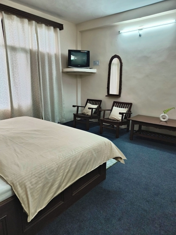 Imagen de la habitación del Hotel THE KAILASHA. Foto 6