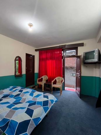 Imagen de la habitación del Hotel THE KAILASHA. Foto 11