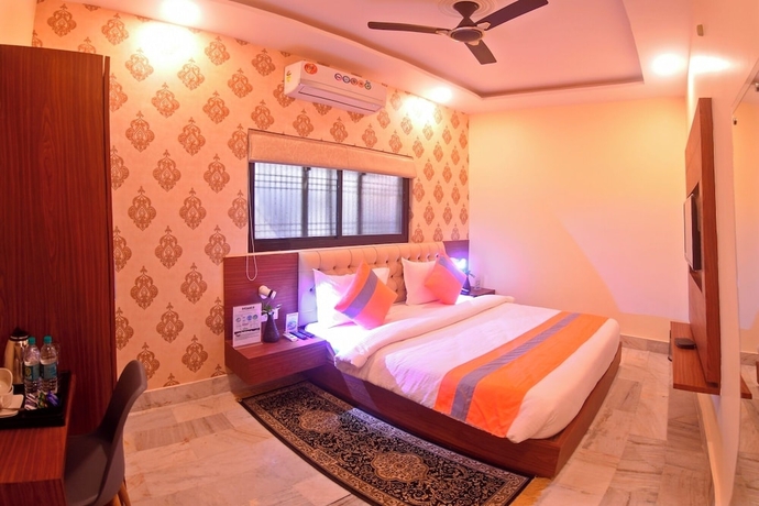 Imagen de la habitación del Hotel THE KASHI RESIDENCY. Foto 6