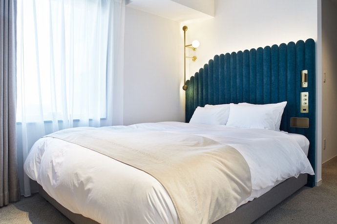 Imagen de la habitación del Hotel THE KNOT Hiroshima. Foto 2