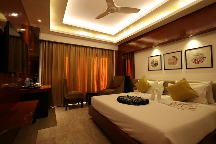 Imagen de la habitación del Hotel THE LATITUDE LUXURY. Foto 18