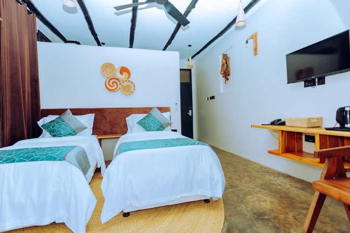 Imagen de la habitación del Hotel THE MARIDADI HOTEL. Foto 10
