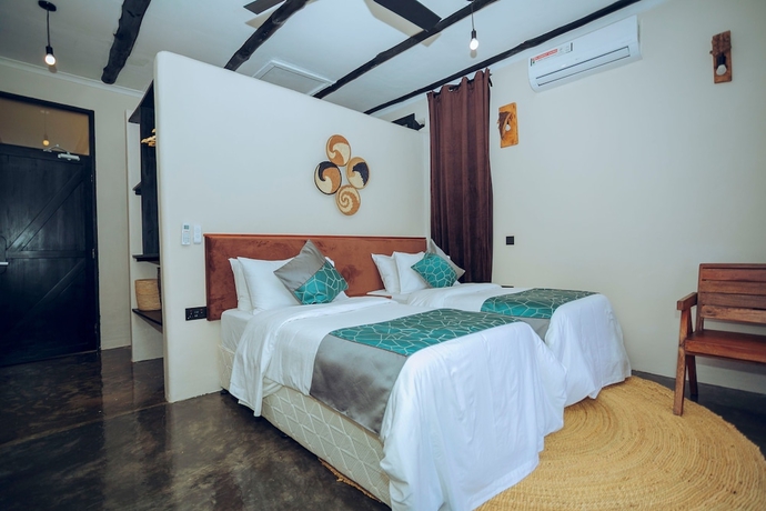 Imagen de la habitación del Hotel THE MARIDADI HOTEL. Foto 11
