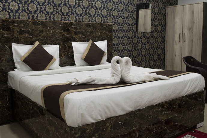 Imagen de la habitación del Hotel THE MIDLAND, Bhubaneshwar. Foto 10