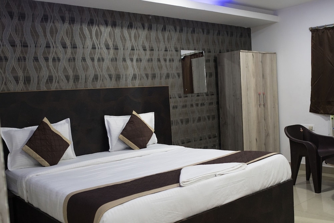 Imagen de la habitación del Hotel THE MIDLAND, Bhubaneshwar. Foto 11
