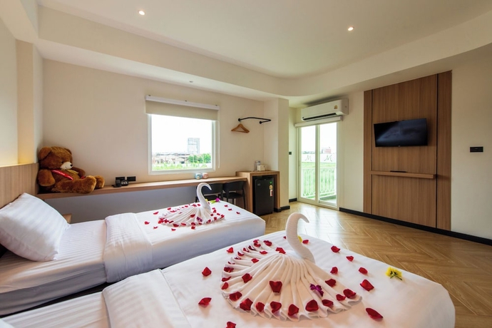 Imagen de la habitación del Hotel THE MOMENT, Khlong Luang. Foto 5