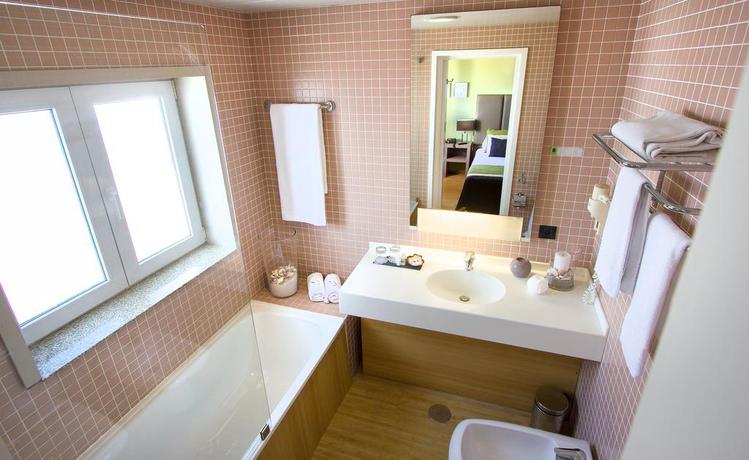 Imagen de la habitación del Hotel THE ONE Grand Hotel da Póvoa. Foto 9