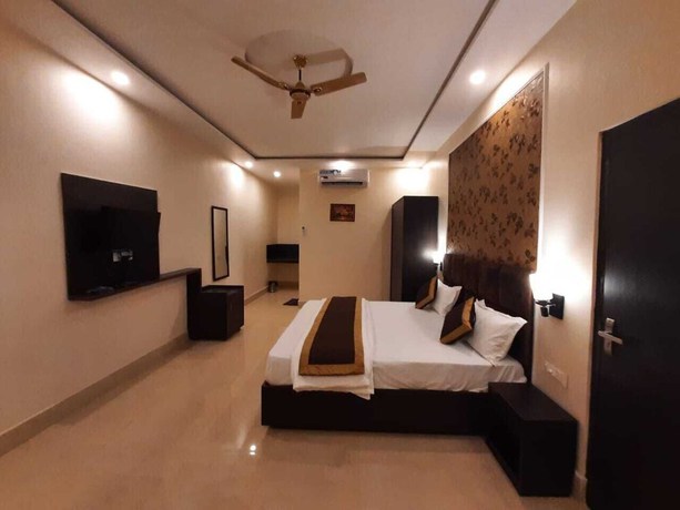 Imagen de la habitación del Hotel THE PALMS RESORT, Dehradun. Foto 9
