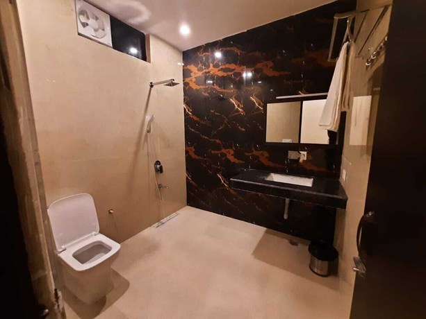 Imagen de la habitación del Hotel THE PALMS RESORT, Dehradun. Foto 10