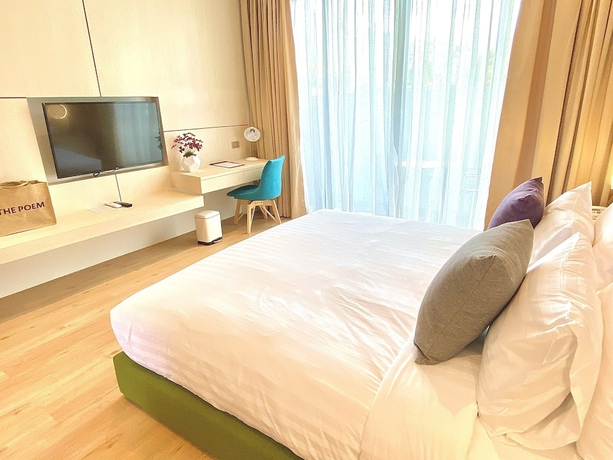 Imagen de la habitación del Hotel THE POEM HOTEL. Foto 9
