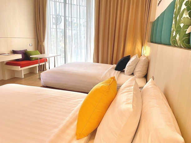 Imagen de la habitación del Hotel THE POEM HOTEL. Foto 11