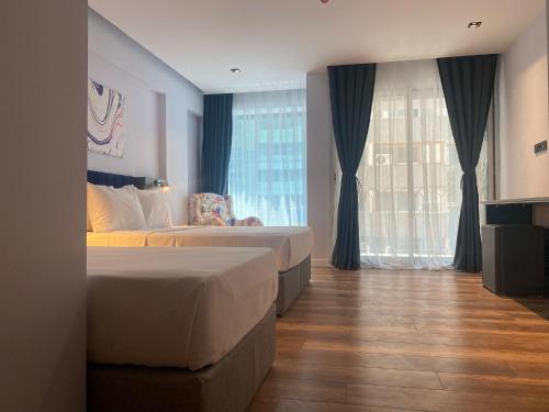 Imagen de la habitación del Hotel THE ROYALS HOTEL, Konak. Foto 17