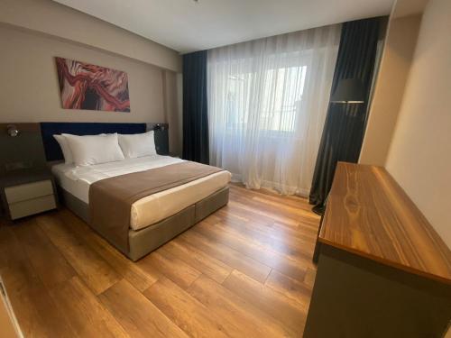 Imagen de la habitación del Hotel THE ROYALS HOTEL, Konak. Foto 20
