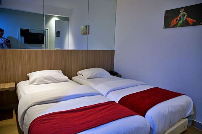 Imagen de la habitación del Hotel THE SATO HOTEL. Foto 12