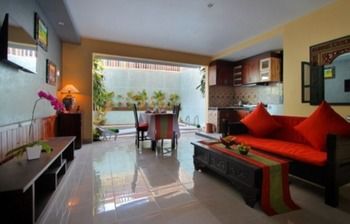 Imagen de la habitación del Hotel THE SESARI JIMBARAN. Foto 7