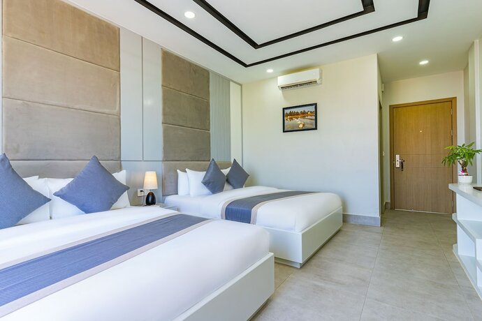 Imagen de la habitación del Hotel THE SQUARE KAMPOT HOTEL. Foto 12