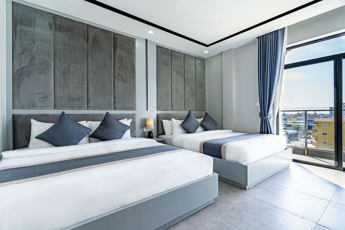 Imagen de la habitación del Hotel THE SQUARE KAMPOT HOTEL. Foto 18