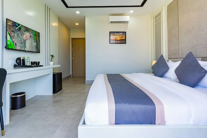 Imagen de la habitación del Hotel THE SQUARE KAMPOT HOTEL. Foto 20