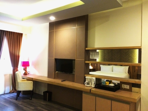 Imagen de la habitación del Hotel THE SYA Regency Palu by SoASIA. Foto 9
