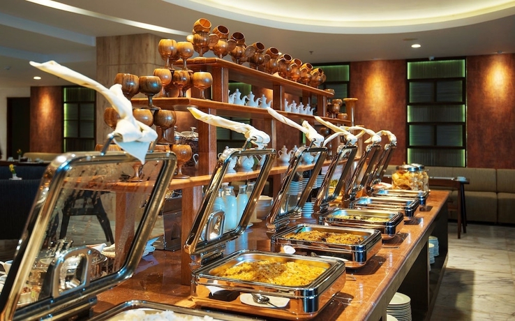 Imagen del bar/restaurante del Hotel THE SYA Regency Palu by SoASIA. Foto 2