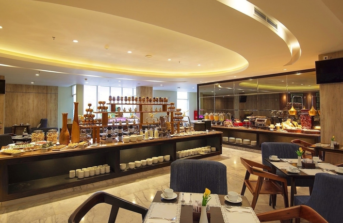 Imagen del bar/restaurante del Hotel THE SYA Regency Palu by SoASIA. Foto 6