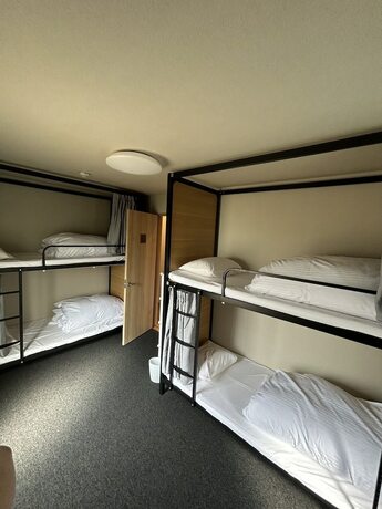 Imagen de la habitación del Hotel THE TOYA. Foto 13