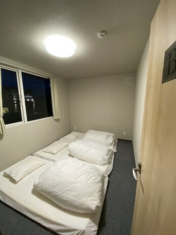 Imagen de la habitación del Hotel THE TOYA. Foto 15