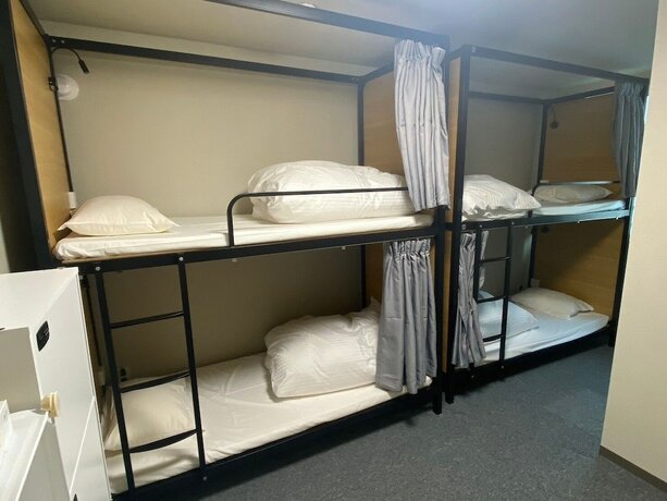 Imagen de la habitación del Hotel THE TOYA. Foto 16