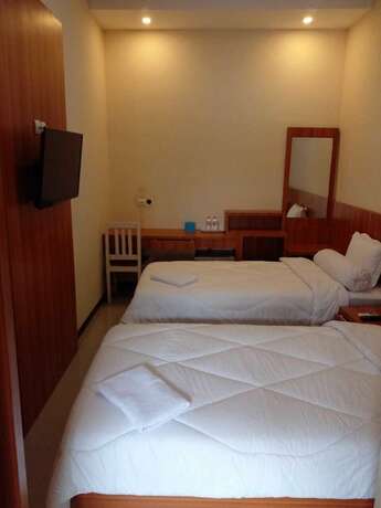 Imagen de la habitación del Hotel THE WISMA SOLO SYARIAH. Foto 5