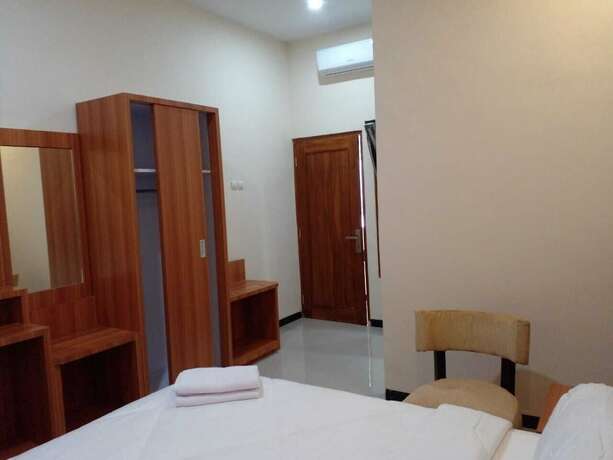 Imagen de la habitación del Hotel THE WISMA SOLO SYARIAH. Foto 6