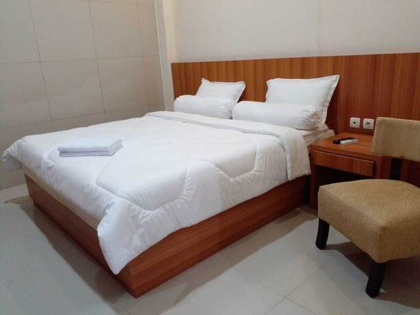 Imagen de la habitación del Hotel THE WISMA SOLO SYARIAH. Foto 7