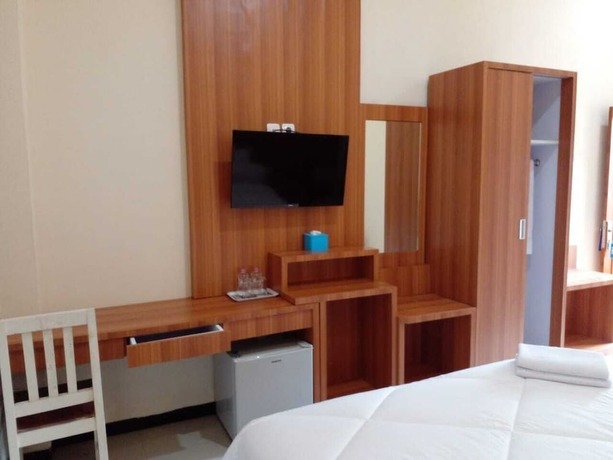 Imagen de la habitación del Hotel THE WISMA SOLO SYARIAH. Foto 8