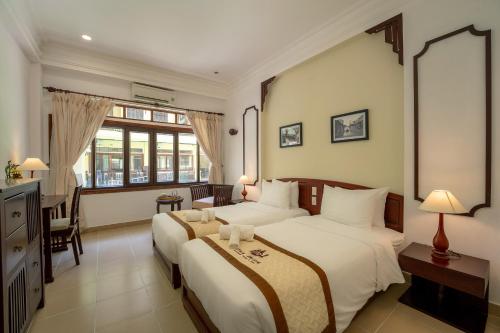 Imagen de la habitación del Hotel THUY DUONG 3 Boutique Hotel & Spa. Foto 17