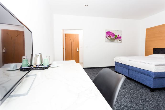 Imagen de la habitación del Hotel TIF hotel and restaurant. Foto 11