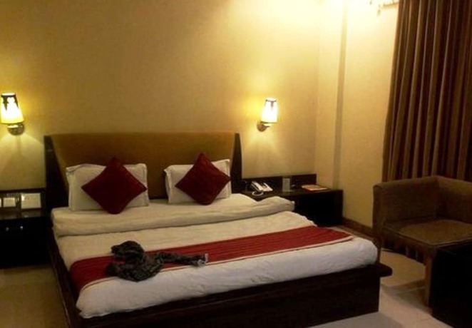 Imagen de la habitación del Hotel TIH Caravan Sarai. Foto 17