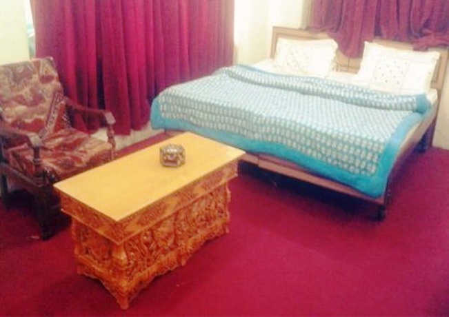 Imagen de la habitación del Hotel TIH City Palace. Foto 8