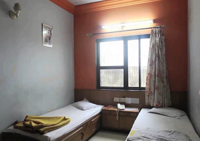 Imagen de la habitación del Hotel TIH City Palace. Foto 10