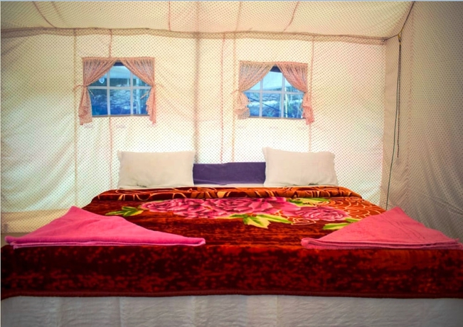 Imagen de la habitación del Hotel TIH Julley World Camp. Foto 10