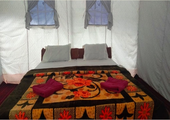 Imagen de la habitación del Hotel TIH Julley World Camp. Foto 11