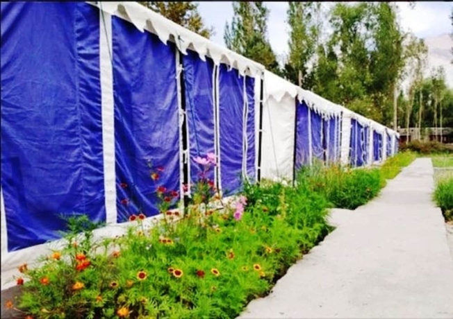 Imagen de la habitación del Hotel TIH Julley World Camp. Foto 15